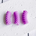 Macro shot of three purple spiral resin beads for DIY handmade jewelry crafting - Purple(4#)