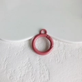 Close-up of pink round spring ring clasp with metal alloy finish for DIY keychains - Matte Pink (KP5425)