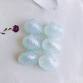 Close-up of six iridescent light blue shell-shaped acrylic beads for DIY jewelry making - L / Aurora Light Blue (4#)