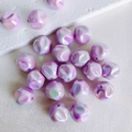 Macro detail of 16mm iridescent macaron acrylic beads with textured finish for DIY jewelry - Lavender (5#)