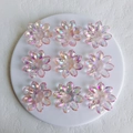 Macro shot of iridescent AB acrylic lotus flower charms for DIY jewelry making - 38x5mm / Pink Large