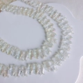 Macro view of iridescent fish-shaped glass beads for DIY jewelry making and beadwork - Aurora Iridescent (2#)