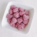 Sparkling pink rhinestone heart-shaped beads for DIY jewelry making in a white ceramic bowl - Pink