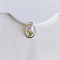 Macro shot of oval enamel flower pendant with pink hearts and pearl for DIY jewelry - Gold Oval Tulip (15#)