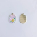 Detail of purple cartoon drink alloy pendant showing front enamel and gold textured back - Purple Canned Drink Style (4#)