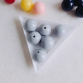 Macro shot of polished light grey acrylic spherical beads with threading hole in a white tray - Light Gray (8#)