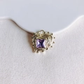 Macro detail of heart pendant with lava texture and purple gemstone in gold finish - Gold Purple Gemstone (3#)
