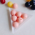 Macro shot of smooth pink acrylic beads with center holes for DIY jewelry making - Pink (9#)