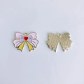 Detail view of double-sided heart butterfly alloy charms for DIY jewelry making - Pink Bowknot Style (12#)
