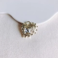 Detailed close-up of golden irregular heart pendant with square zircon on white tray - Gold Clear Gemstone (5#)