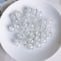 Detailed macro view of 12mm clear acrylic cube beads with inner white sphere core - Transparent Cube with White Core