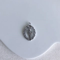 Close-up of silver tulip relief pendant with lace edges for DIY jewelry making - Silver Vintage Tulip Style (9#)