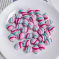 Detailed macro shot of colorful striped acrylic beads for DIY jewelry and bracelet making - Pink Blue White Diagonal Stripes (2# Lampwork)