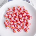 Detailweergave van roze en oranje spiraalvormige acryl kralen voor DIY sieraden - Roze Oranje Spiraal Witte Stippen (10# Lampwork)