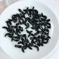 Macro shot of glossy black V-shaped acrylic beads for DIY jewelry and phone chains - Black Moon Shaped Bead (2#)