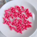 Close-up of glossy bright pink acrylic crescent moon beads for DIY jewelry making - Bright Pink Moon Shaped Bead (3#)