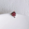 Macro detail of a pink round faceted crystal pendant with a silver DIY jewelry loop - Silver Base Pink Rhinestone (12#)