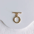 Detail view of golden moon-shaped toggle clasp with unique hammered texture for DIY jewelry - Style 2 OT Toggle Clasp (K Gold)