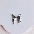 Vue détaillée du pendentif papillon en métal liquide argenté pour bijoux DIY - Papillon en Métal Liquide Argenté (12#)