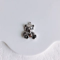 Close-up of polished silver bear charm with black enamel details for DIY jewelry making - Abstract Bear Pendant (White K)