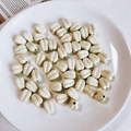 Creamy white petal-shaped acrylic beads with side holes for DIY jewelry making - Cream White Flower Bud Bead (06#)