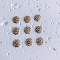 Detailed view of 18K gold hollow flower spacers for DIY jewelry making and beading projects - Style 11 (11#)
