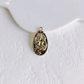 Detailed view of an oval gold-plated pendant with vintage sun relief for DIY jewelry - Gold Oval Relief (1#)