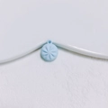 Detail view of light blue resin charm with radial texture for DIY jewelry making - Light Blue Bun Style (3#)