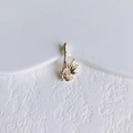 Detailed view of a gold bamboo leaf pendant with polished finish and elegant metal texture - Gold Bamboo Style (1#)