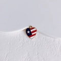 Close-up of heart-shaped American flag charm with white star on a white stone base - Flag Element Heart Shape (7#)
