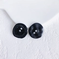 Detailed view of two vintage black textured buttons for DIY handmade jewelry crafting - Black Button (5# Large)