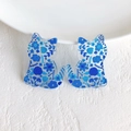 Macro detail of acrylic cat charms featuring intricate blue floral patterns and glossy finish - Blue Leaf Floral Cat (8)