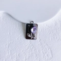Detailed macro view of silver rectangle pendant with tulip design and purple gemstone - Silver Purple Tulip Rectangle (6#)