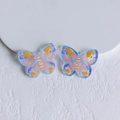 Close-up of colorful butterfly acrylic DIY charms with hand-painted patterns and top holes - Light Blue Hand-painted Abstract Butterfly (17)