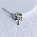 Macro detail of a golden heart pendant with purple teardrop gem and liquid drip effect - Gold Purple Open Heart (13#)