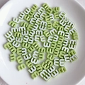 Macro shot of candy-colored light green M letter alloy beads for DIY jewelry making - Light Green Style (7)
