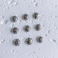 Nine silver-plated flower bead caps with hollow six-petal design for DIY jewelry making - Style 12 (12#)