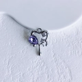 Close-up of liquid metal heart pendant with purple pear-cut gem and white zircons - Silver Light Purple Open Heart (16#)