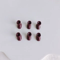 Macro detail of six miniature wine red resin boot charms for DIY jewelry and crafts - Deep Burgundy (2)