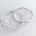 Multi-layer silver memory wire coil bracelet with a minimalist metallic finish for DIY jewelry - One Roll / Silver Plated