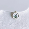 Enamel flower charm featuring blue tulips and a butterfly in a round golden frame - Wavy Edge Blue Flower Pendant (37#)