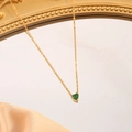 Elegant gold heart pendant necklace featuring a green birthstone on luxury satin - May (Dark Green)
