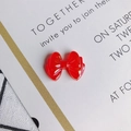 Macro detail of a glossy red resin bow charm for DIY jewelry making and hair accessories - Red (5#)