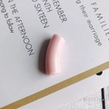 Macro view of a smooth pink curved resin tube bead for DIY jewelry making - 10 Pieces Pack / Lotus root pink