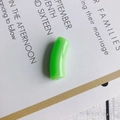 Macro shot of neon green curved resin tube beads for DIY jewelry making accessories - 10 Pieces Pack / Green
