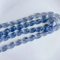 Détail macro de perles ovales facettées en verre bleu cristal pour la création de bijoux - Fil de Perles Tonneau Facettées Bleu Royal(5#)