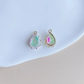 Macro shot of teardrop iridescent crystal pendants with gold-plated copper edge detail - Colorful Aurora AB Luster Style (4#)