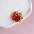 Detail of amber orange iridescent acrylic rose flower with shimmering aurora coating - 7# Aurora Iridescent Amber