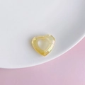 Close-up of faceted hollow heart acrylic pendant in amber yellow for DIY jewelry - Amber Yellow (4#)