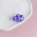 Macro view of purple iridescent chubby cloud acrylic charm with a metallic luster finish - Size 8